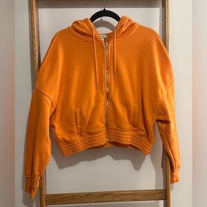 Cropped Orange Zip Up Sweatshirt